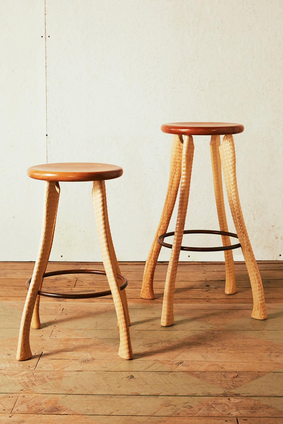 Handmade cherry and ash bar stool and counter stool with ax handle legs and hand-bent iron footrest ring, Bradford Woodworking, Worcester PA